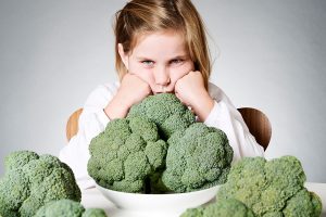 Girl with broccoli