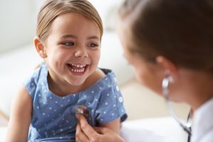 Young girl with pediatrician