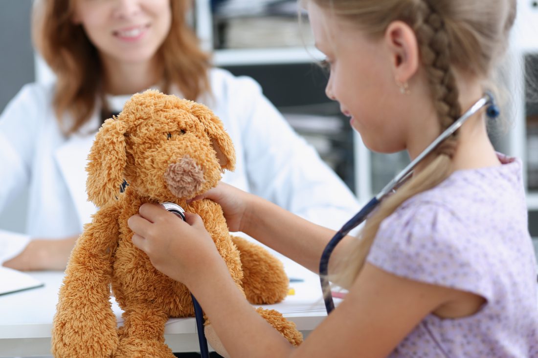 Pretend play and stuffed animals can ease kid's anxiety during doctor visits. A pediatrician explains how play builds comfort and trust